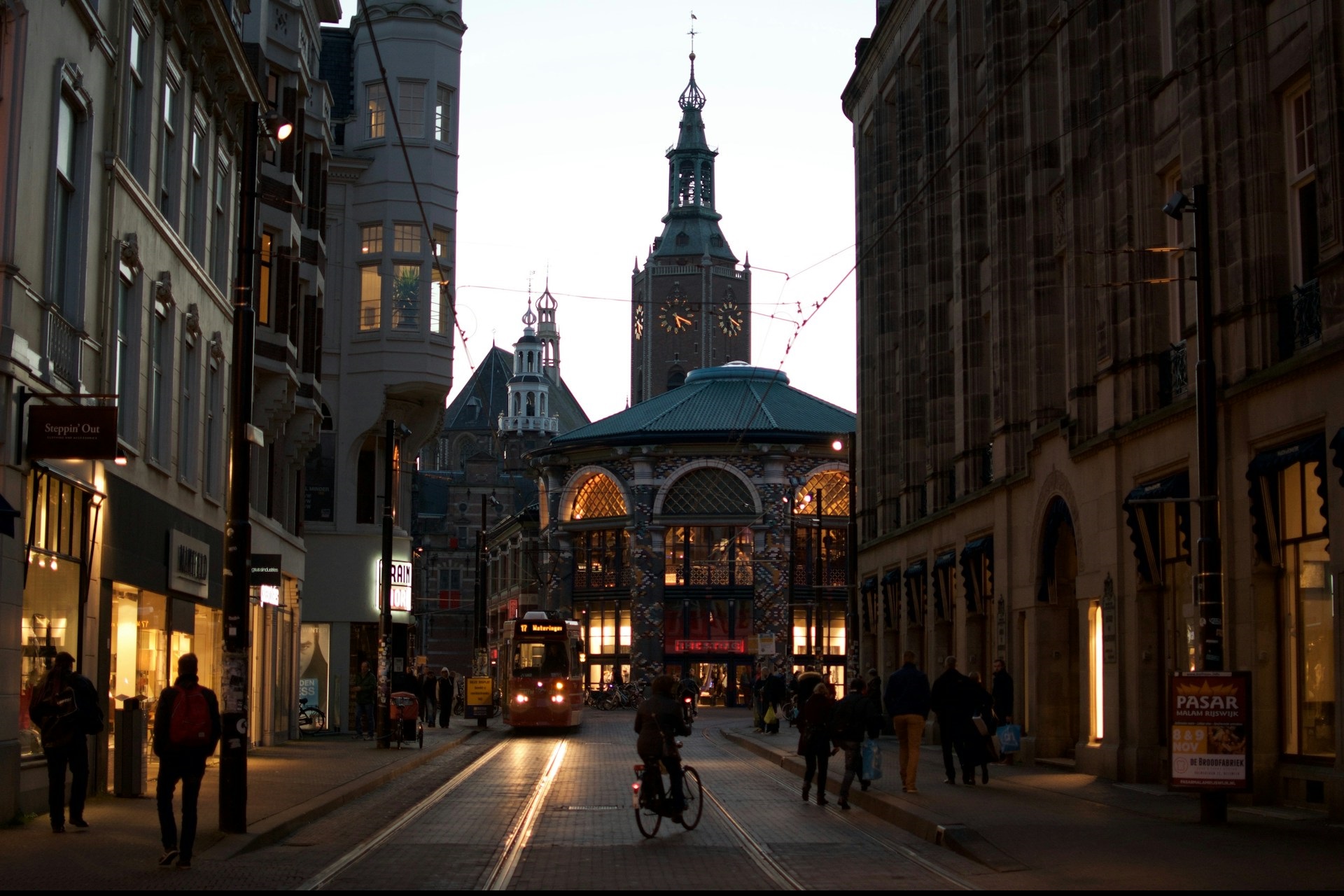 a dusk tram street in The Hague